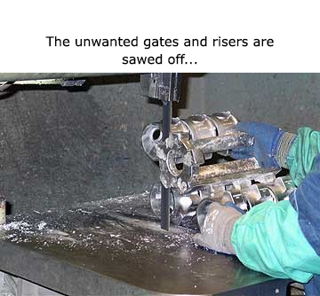 The unwanted gates and risers are sawed off